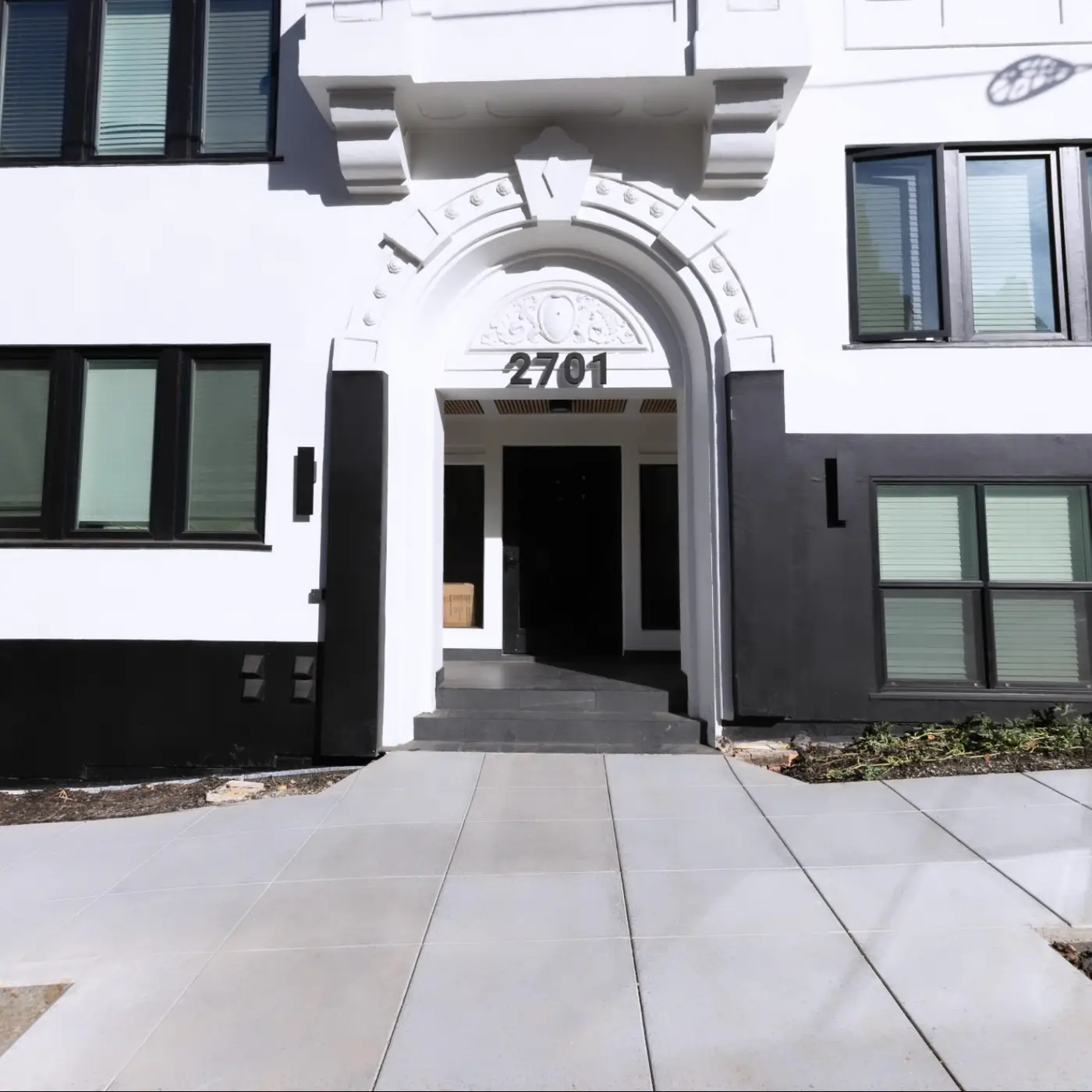 Building entry arch + new sidewalk panels — Durant Sidewalk — UC Berkeley, Berkeley, CA