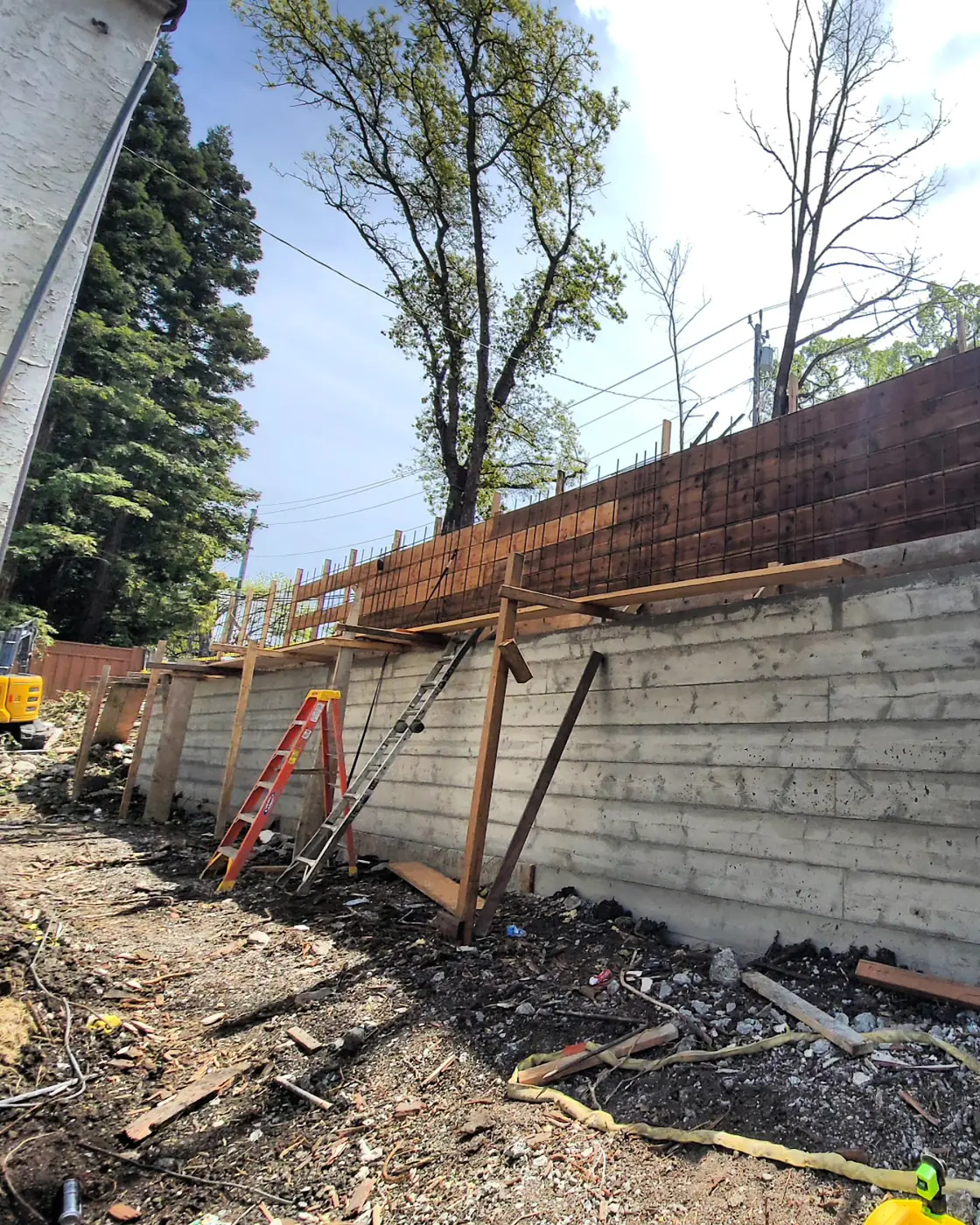 Wall partially poured, rebar exposed, formwork — Sound Wall Replacement — Diablo Country Club, Danville, CA