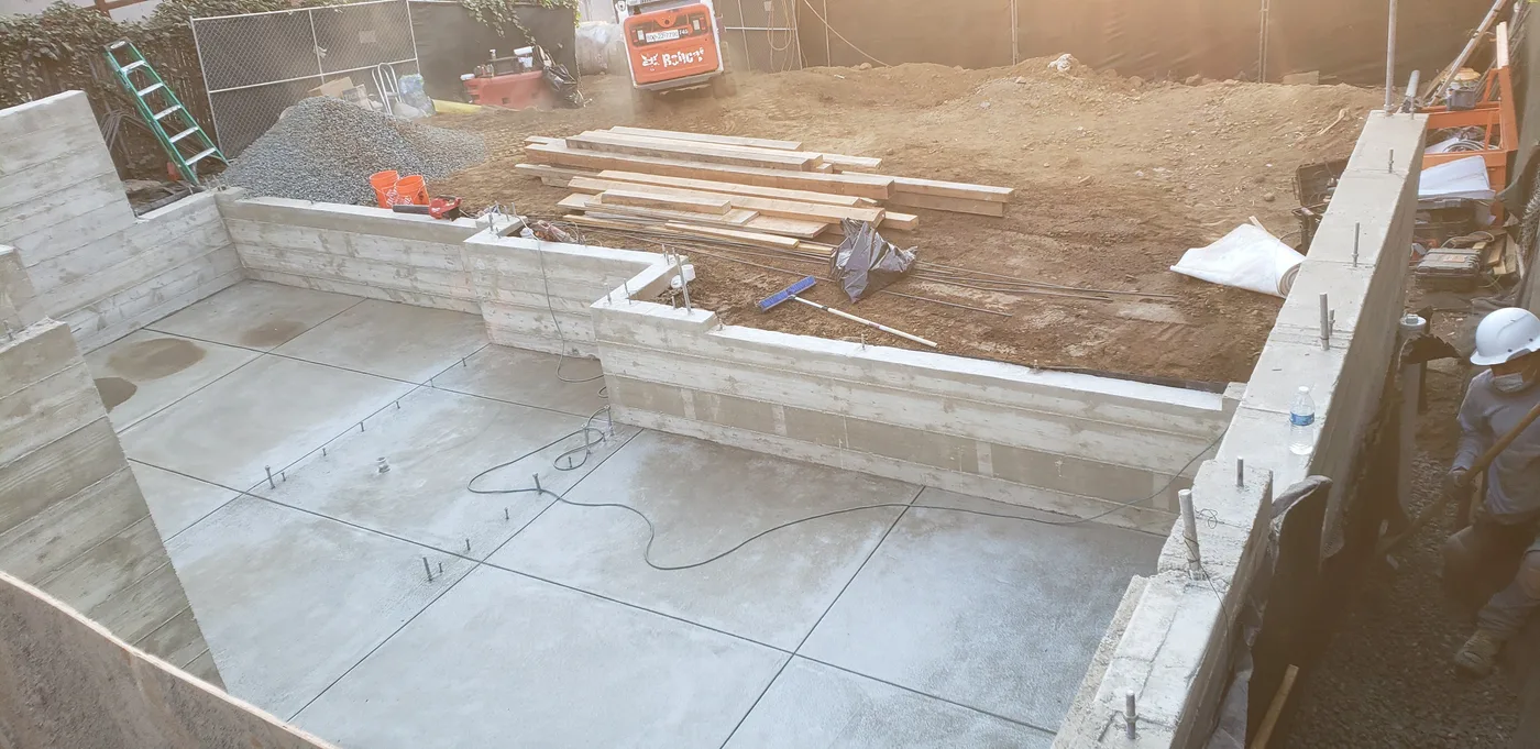 Poured basement floor and walls in the sun — Berkeley Student Housing Foundation, Berkeley, CA