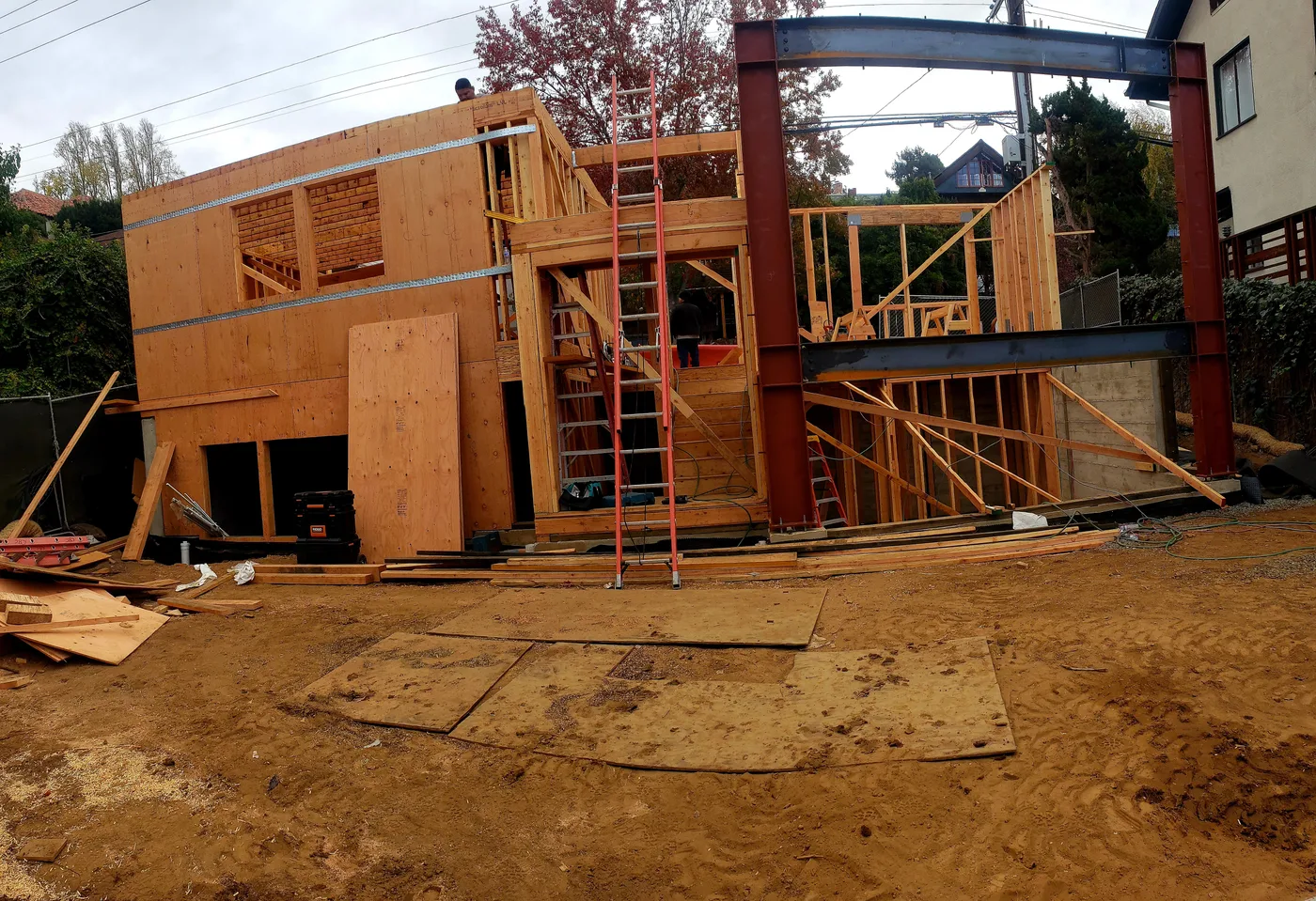 Wood framing and steel beams rising on the finished foundation — Berkeley Student Housing Foundation, Berkeley, CA