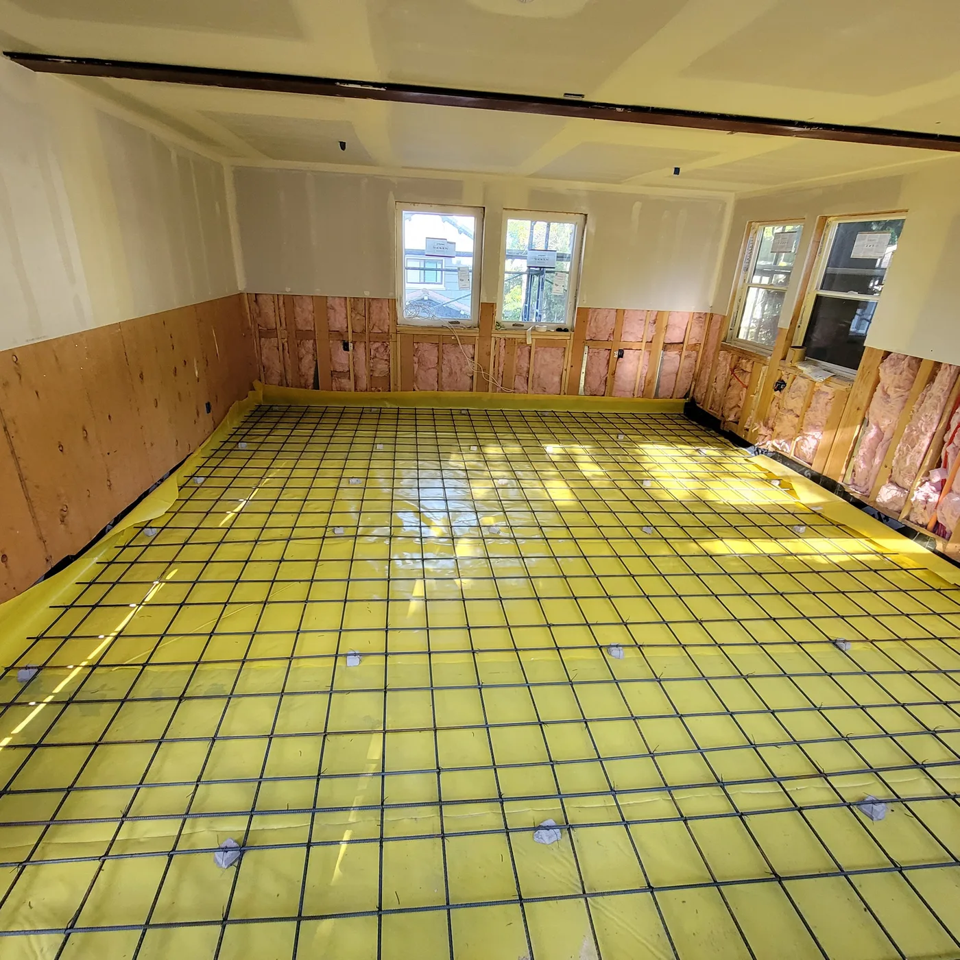 Interior floor prep inside the framed walls — Berkeley Student Housing Foundation, Berkeley, CA