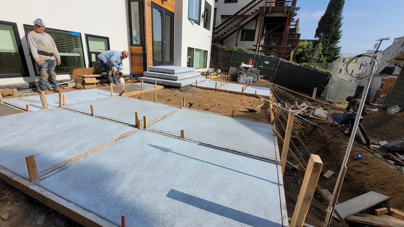 Fresh concrete flatwork formed alongside the building — Berkeley Student Housing Foundation, Berkeley, CA