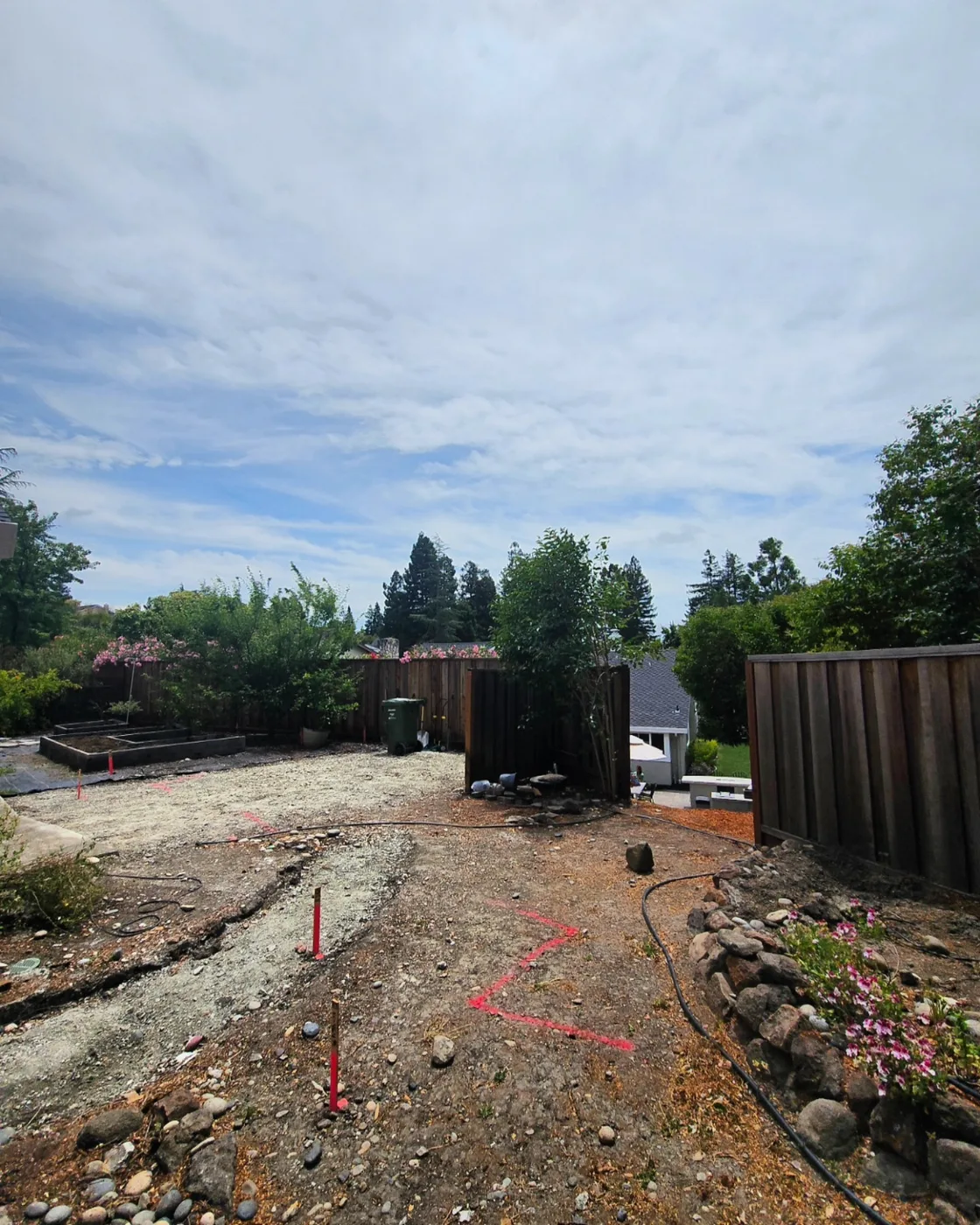 The side-yard site before excavation, the layout marked out in survey paint — Danville ADU Foundation, Danville, CA