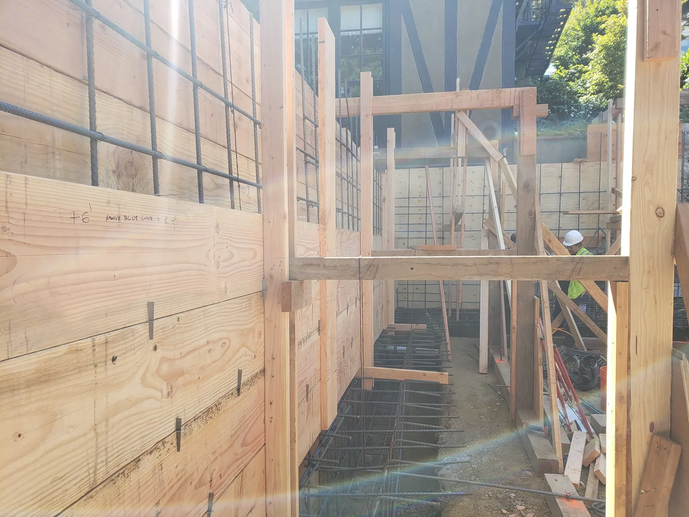 Wood formwork and rebar for the reinforced retaining walls — Lombard Street Basketball Court Foundation, San Francisco, CA