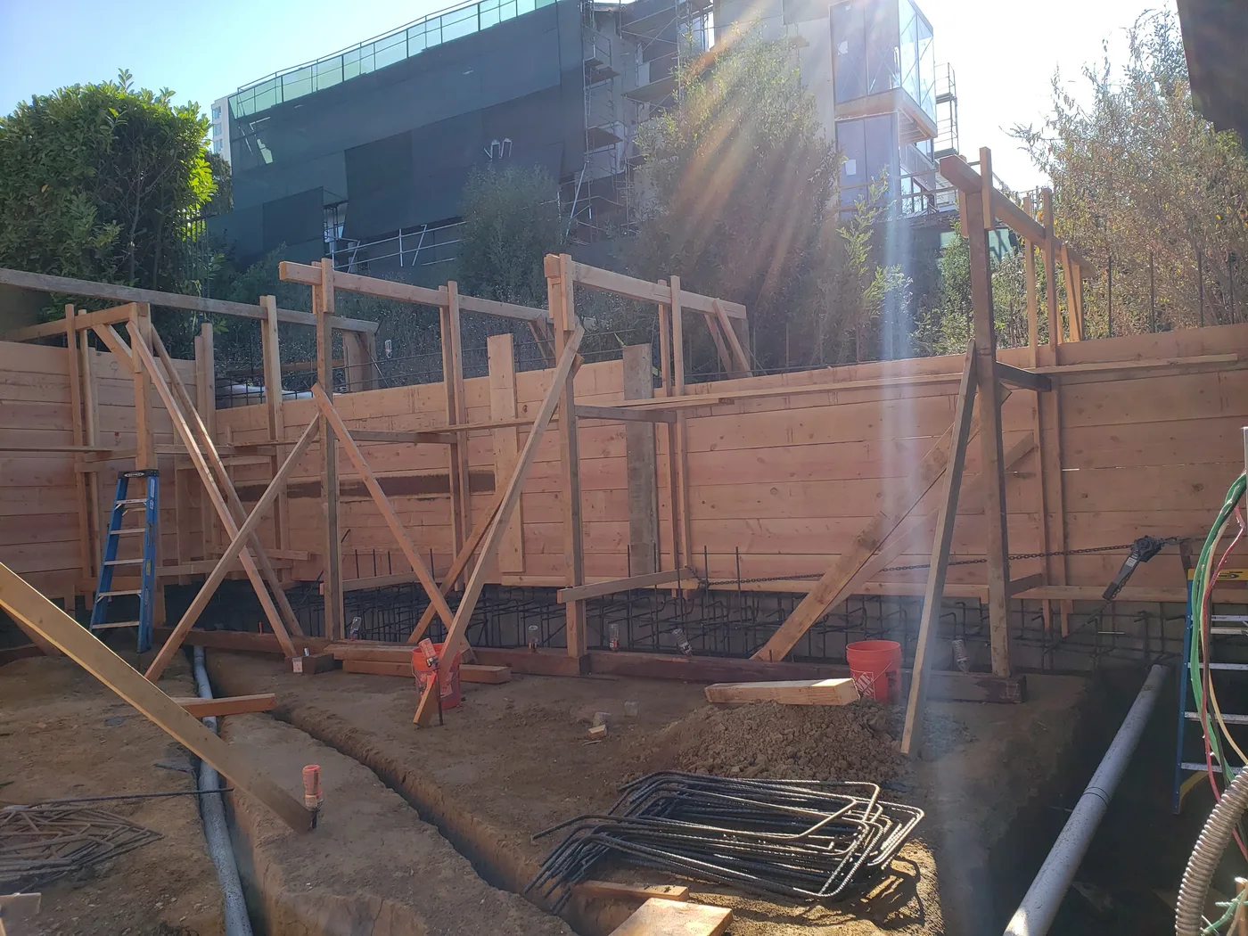 Perimeter retaining-wall forms and drainage lines — Lombard Street Basketball Court Foundation, San Francisco, CA