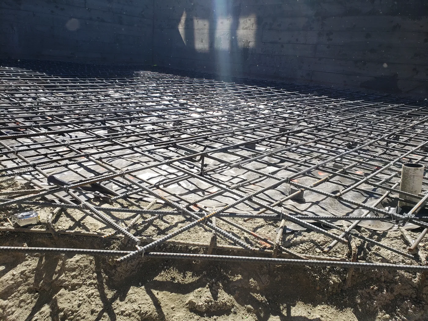 Dense slab reinforcement laid out before the pour — Lombard Street Basketball Court Foundation, San Francisco, CA