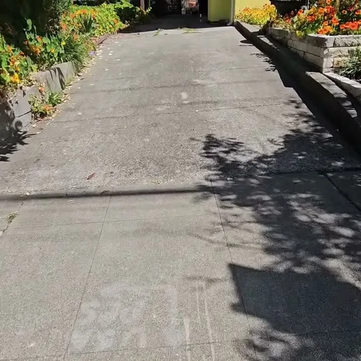 The original gray driveway from the street before the new pour — Oakland Gold Driveway & Patio, Oakland, CA