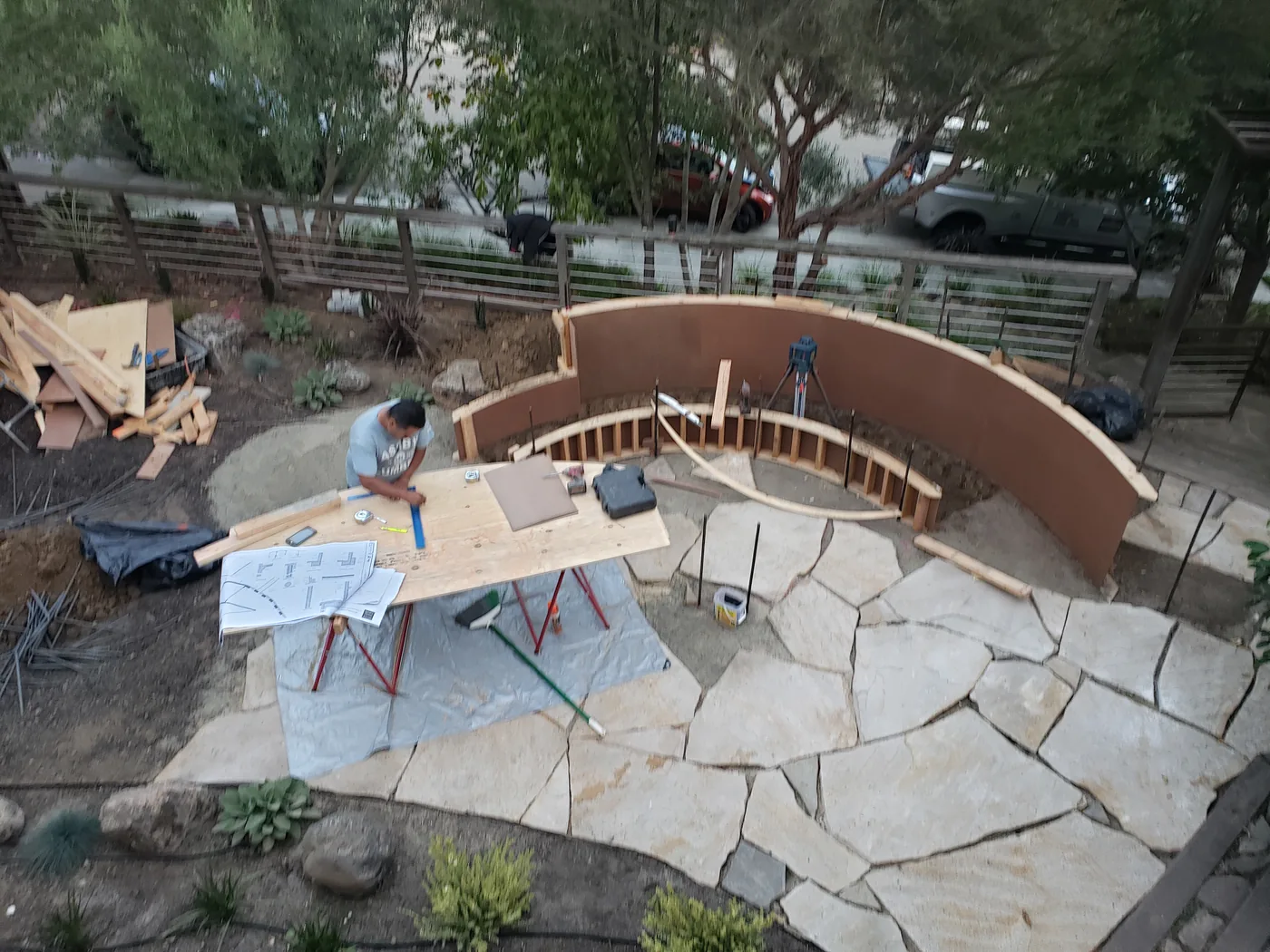 Templating the curve on site as the formwork takes shape — Piedmont Custom Concrete Bench, Piedmont, CA