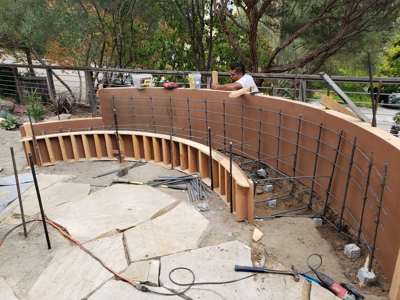 Curved formwork with rebar reinforcement before the pour — Piedmont Custom Concrete Bench, Piedmont, CA