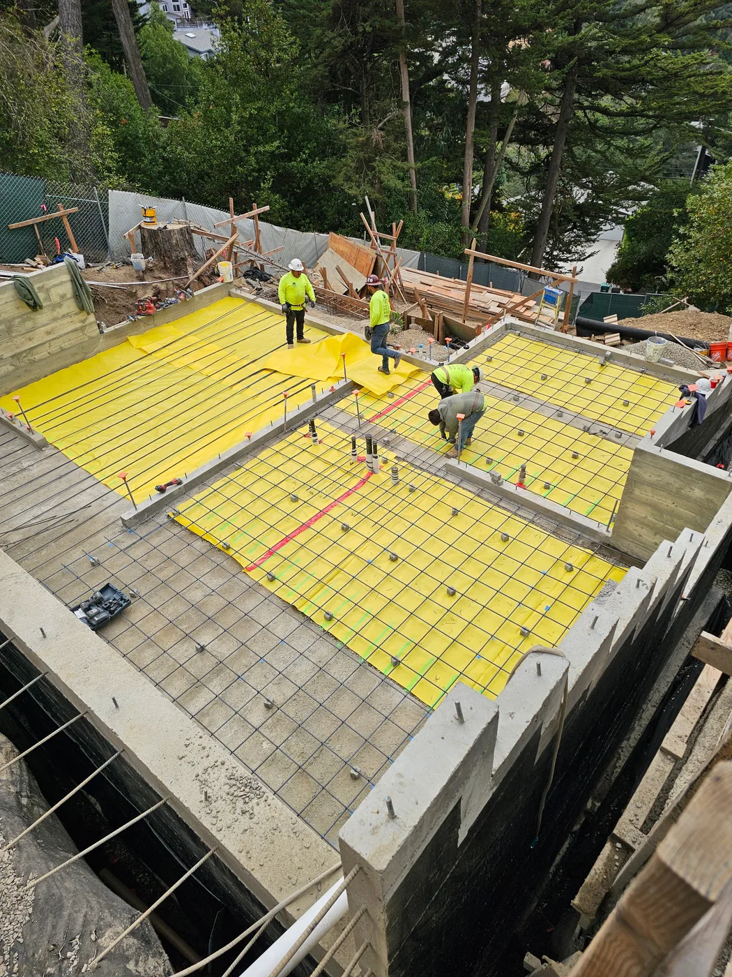 Mat-slab reinforcement grid with crew, formed and ready to pour — Oakland Hills Custom Home, Oakland, CA