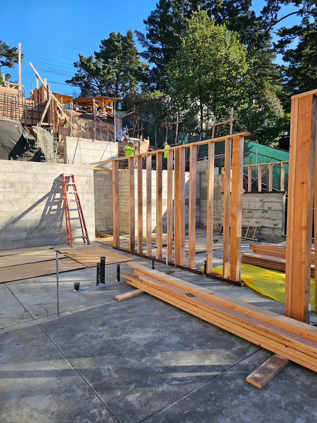 Wood framing rising on the concrete foundation — Oakland Hills Custom Home, Oakland, CA