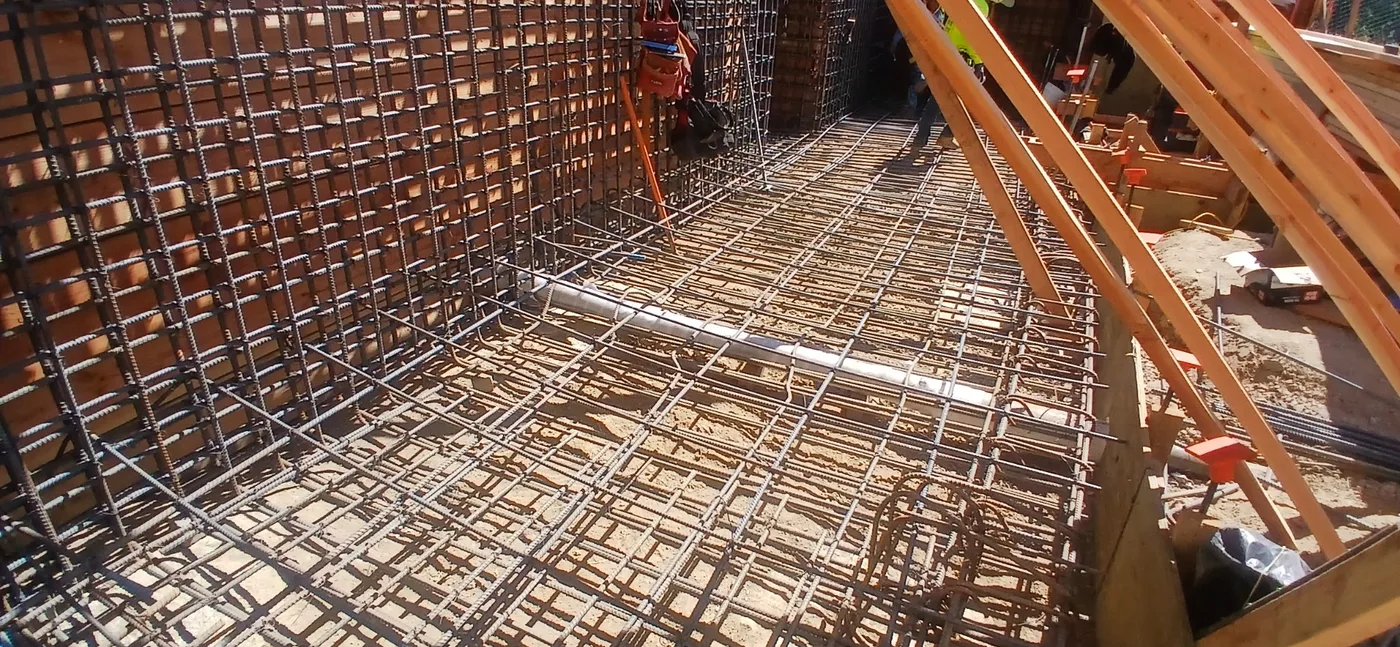 Reinforcing-steel wall and mat cage detail before the pour — Oakland Hills Custom Home, Oakland, CA