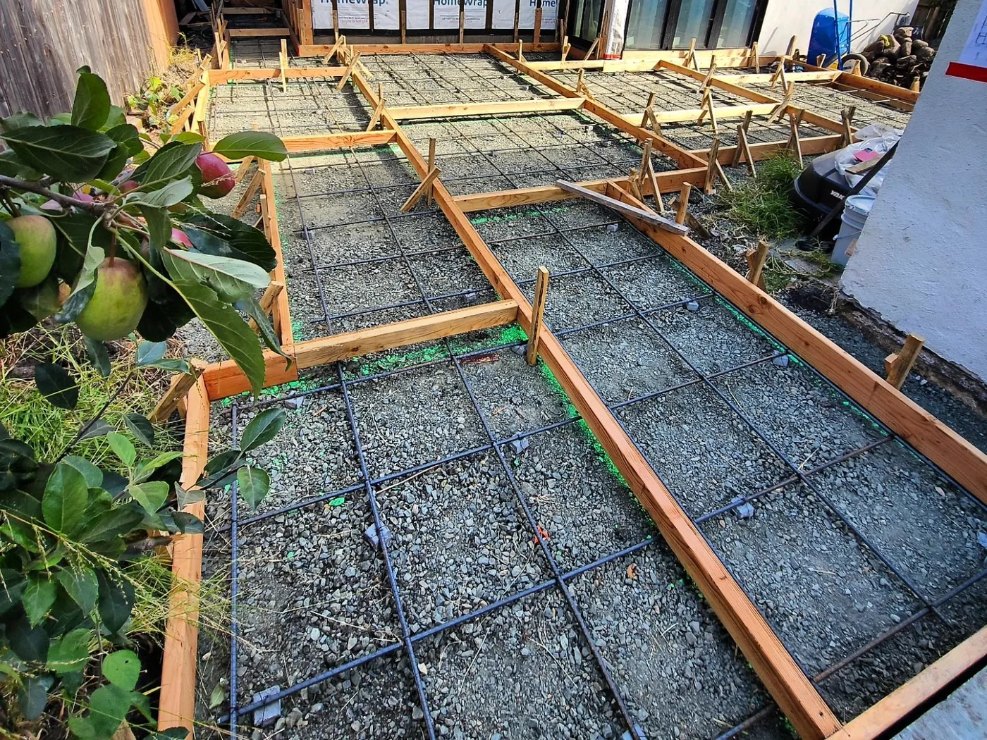 Formed patio panels with rebar grid laid out across the yard — Richmond Outdoor Patio, Richmond, CA