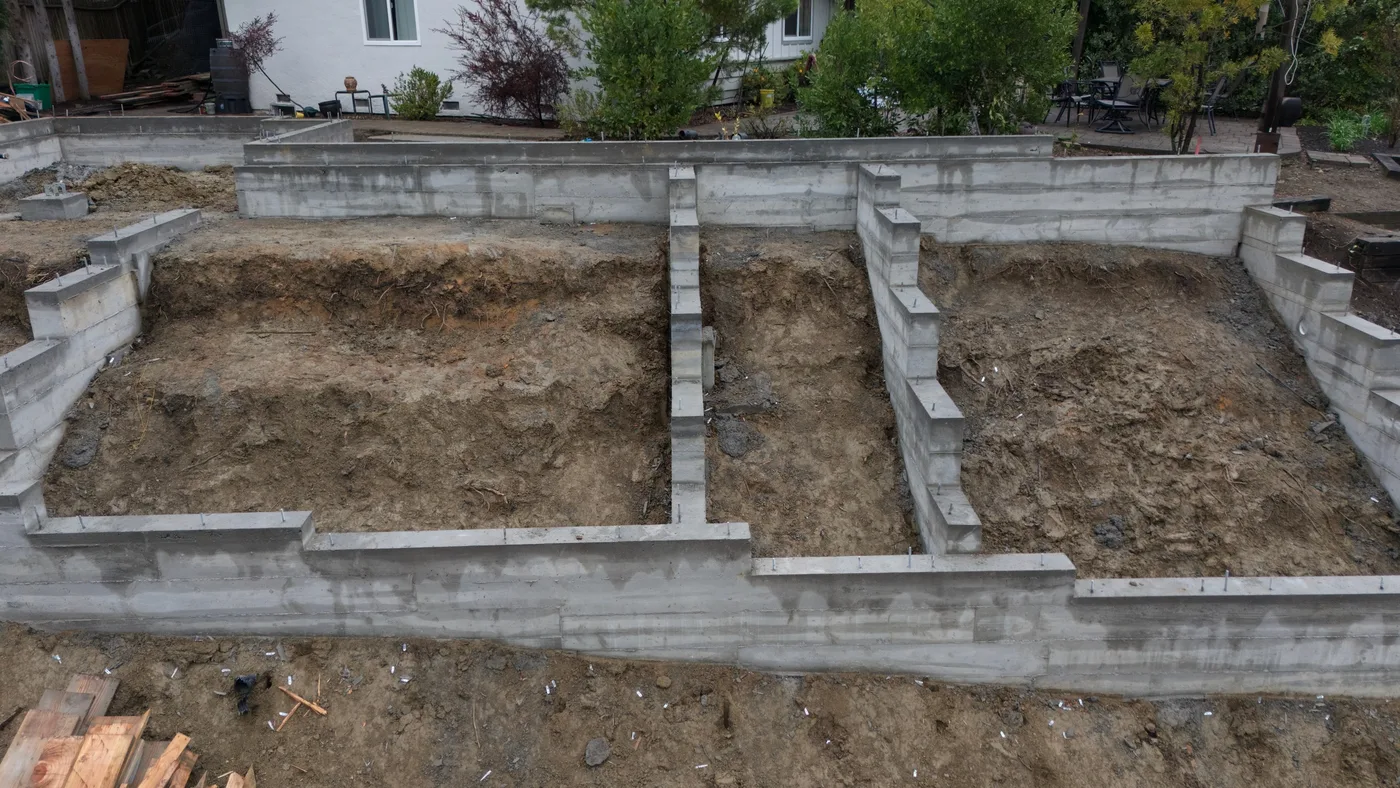 Interior bearing walls and pilasters inside the finished perimeter, crawlspace grade below — Steep Hillside Lafayette ADU, Lafayette, CA
